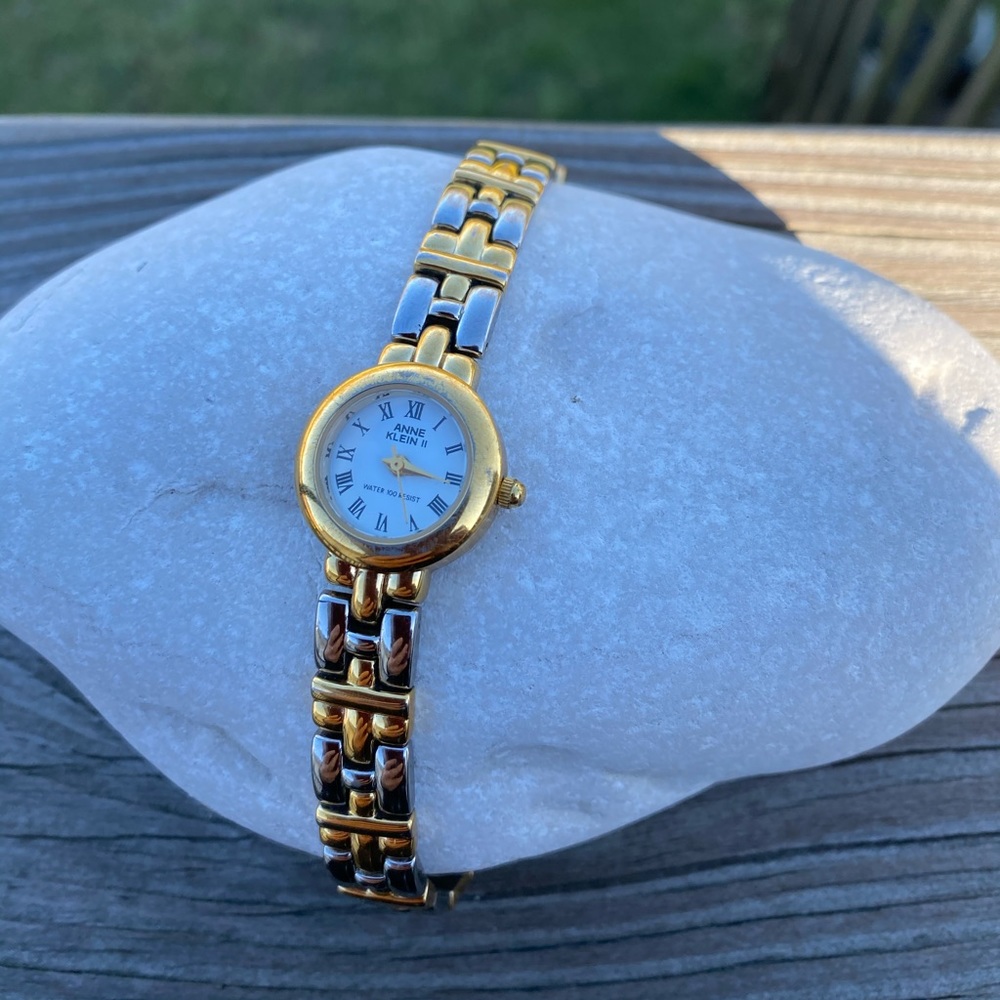 Anne Klein Watch silver and gold tone Roman numerals water resistant 100 ft